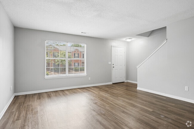 3BR, 2BA - 1,309SF - Living Room - Brookside Pointe Apartments