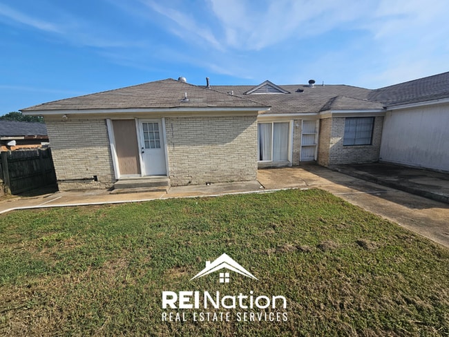 Photo - SPRAWLING 4BR/2BA MEMPHIS HOME! | Brick Fireplace & 2-Car Garage | Fenced Yard!