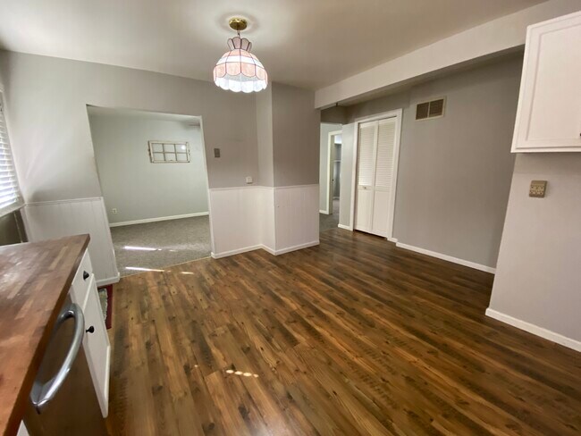 Kitchen looking to living room - 7012 W 138th Ln