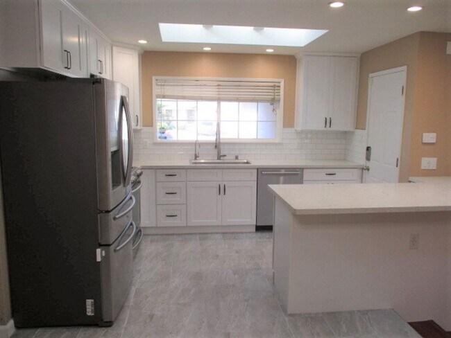 Building Photo - 4 bedroom corner lot home has nice upgrade...