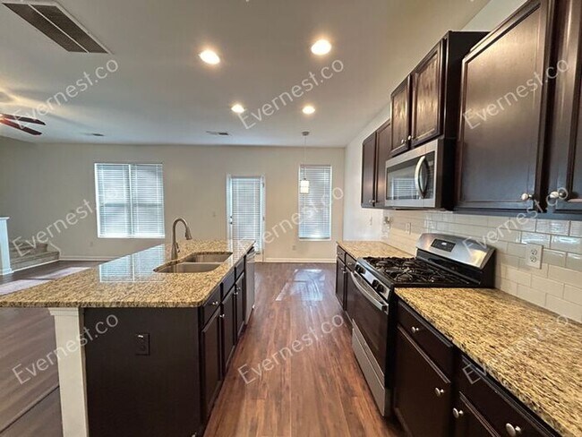 Foto del edificio - 5876 Grande River Rd