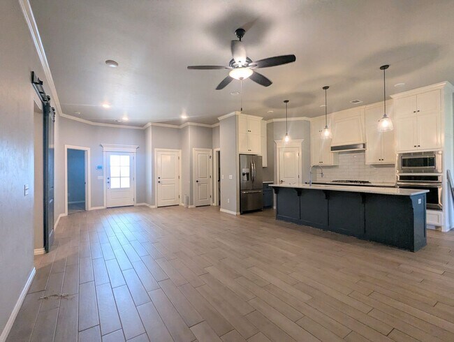 Building Photo - Beautiful Edmond Home | Gas Fireplace, Storm Shelter & Fenced Backyard!