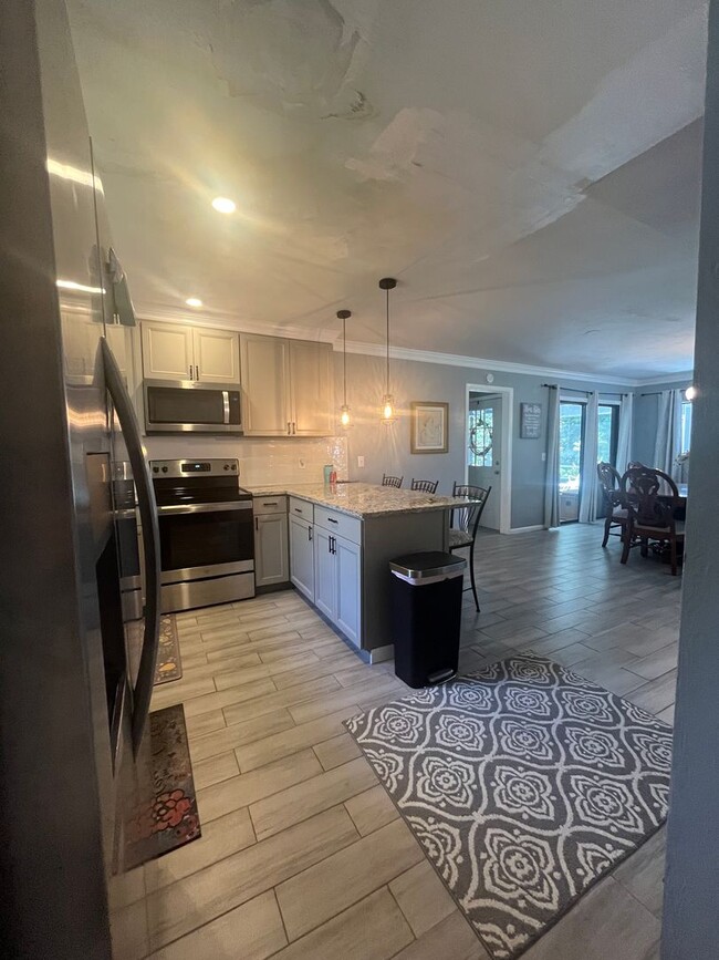 Building Photo - Fully Furnished 3-Bedroom Home in Palm Coa...