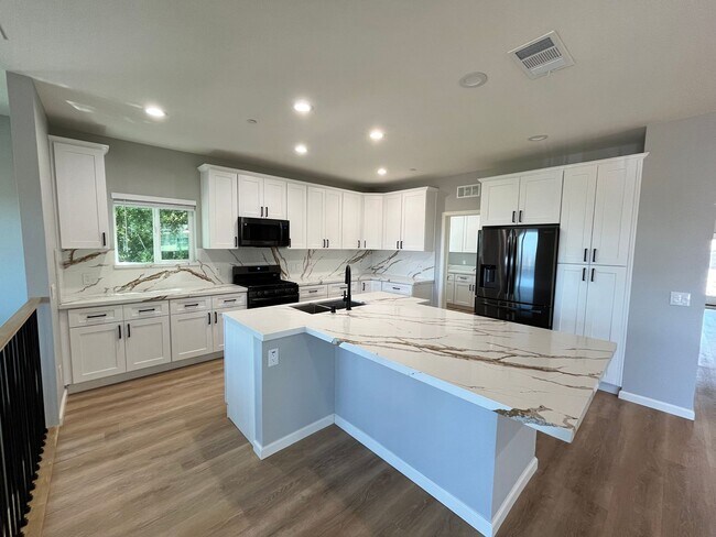 Building Photo - Be the First to Live in This Stunning New ...