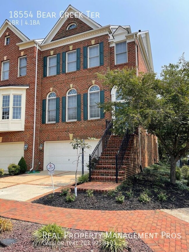 Building Photo - 4 levels brick front River Creek Townhome ...