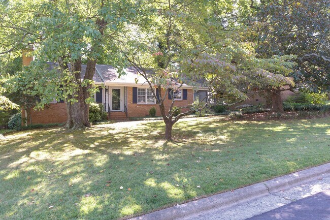 Building Photo - Gorgeous 3 bed 2 bath home with finished basement/carport in NW Greensboro! Lawn care included.