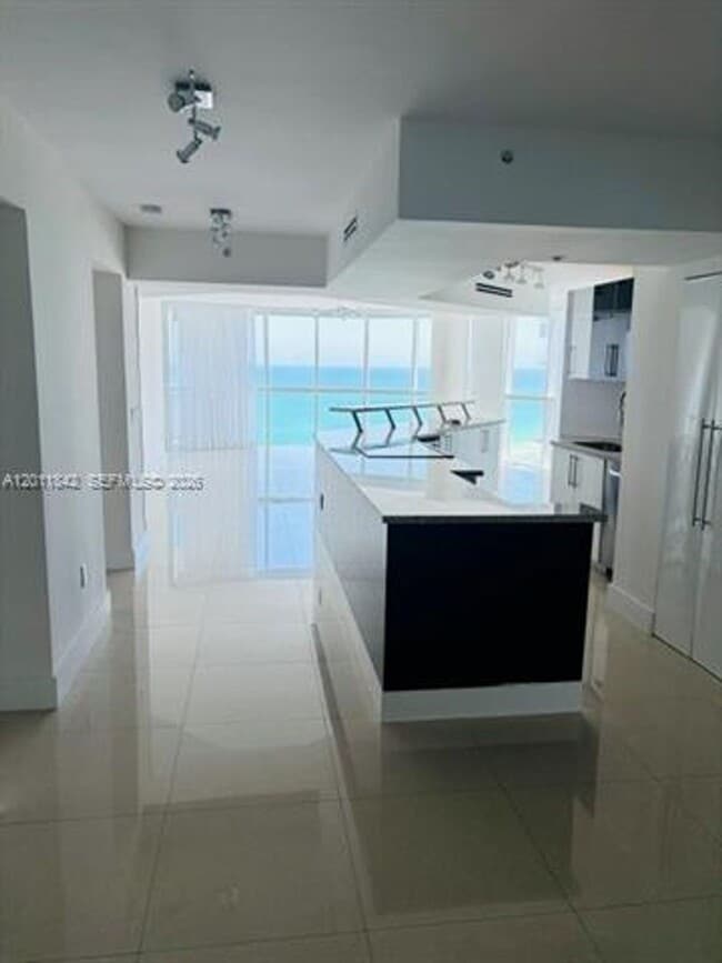 Building Photo - 6301 Collins Ave
