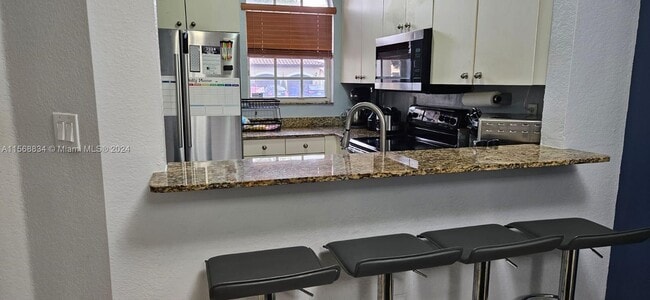 Foto del edificio - 12708 SW 49th Dr