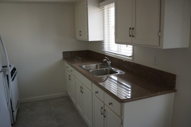 Unit B Vacant - updated kitchen - 2318 Carnegie Ln