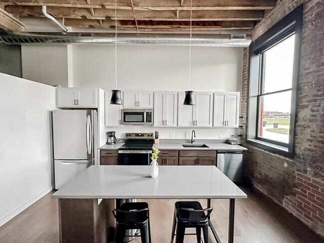 Foto del edificio - 604 W 4th St N