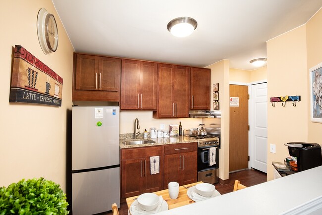 Kitchen w/Stainless Steel Appliances - Brookhaven Manor Senior Living