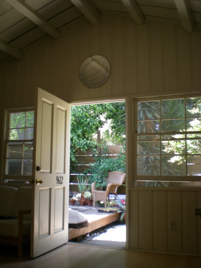 Living room looking onto front deck - 9612 National Blvd