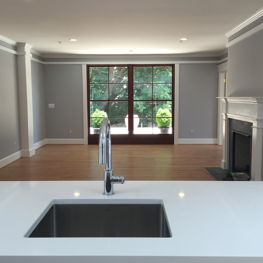 view from kitchen island with fireplace - 1351 Wisconsin Ave NW