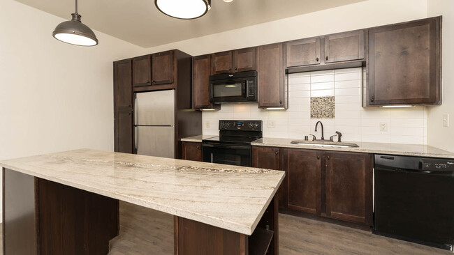 Kitchen with Stainless Steel Appliances - Union at Carrollton Square