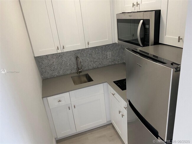 Building Photo - 6647 SW 59th Pl