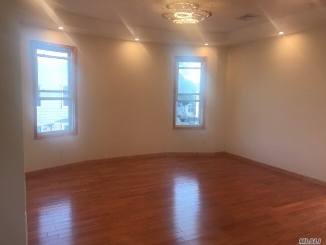 Building Photo - 57-25 Mazeau St