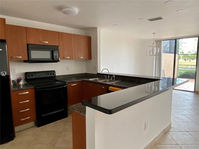 Building Photo - 9709 Costa Del Sol Blvd