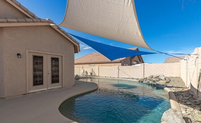 Building Photo - 4 Bedroom, 3 Bath with a Pool!!! Coming Soon!