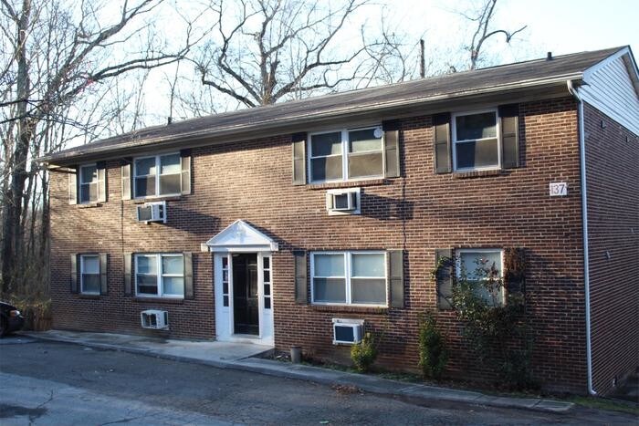 Primary Photo - Spacious & Conveniently Located Apartment