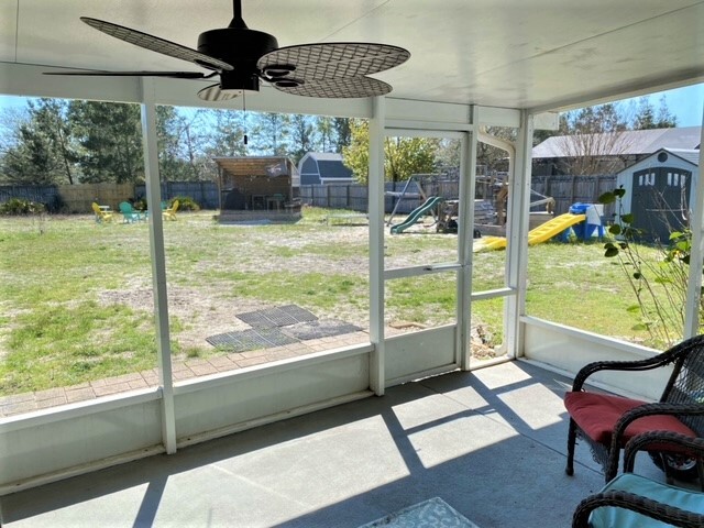 Screened in back patio - 7699 Sandstone St