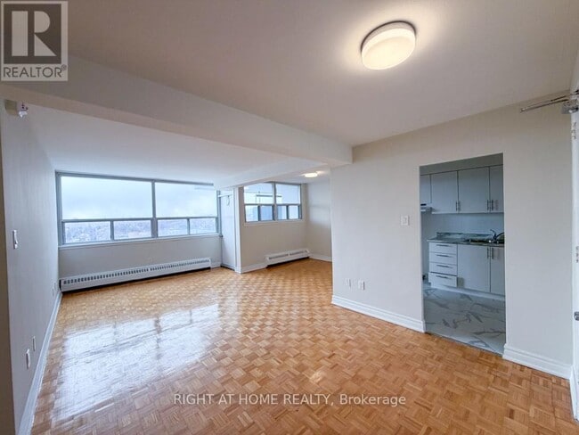 Building Photo - 1440 Lawrence Ave W