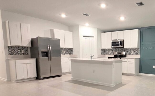 Building Photo - 5130 Magnolia Palm Dr