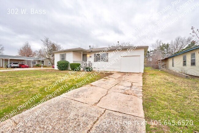 Building Photo - 302 W. Bass-