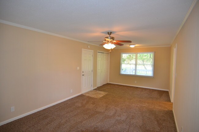 Building Photo - Beautiful all Brick Home w/ Carport