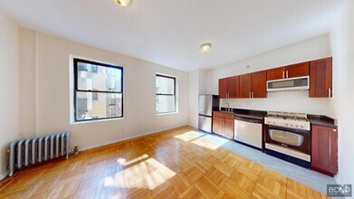 Building Photo - 201-205-205 W 11th St