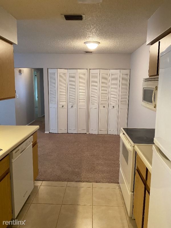Building Photo - 3916 NW Cinnamon Tree Cir