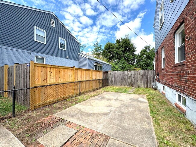 Building Photo - Charming 2BR Townhome with Finished Basement, Fenced Yard & Private Driveway Near Huntington Metro