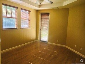 Building Photo - 3582 SW Sawgrass Villas Dr