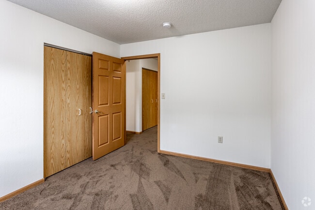 2BR, 1BA - 800SF - First Bedroom - Swisshelm Village Apartments
