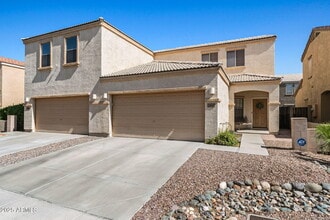 Building Photo - 7042 W Mercer Ln