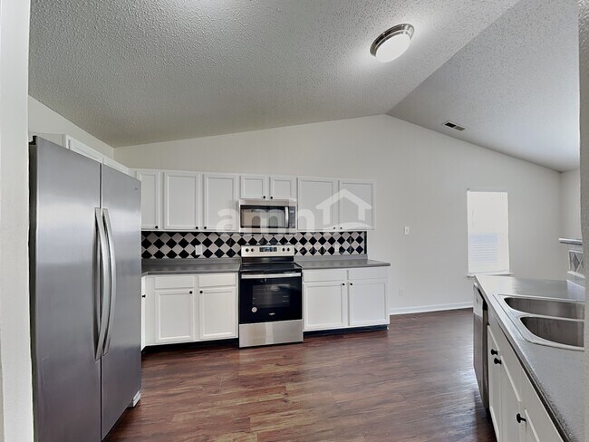 Foto del edificio - 5624 Grassy Bank Dr