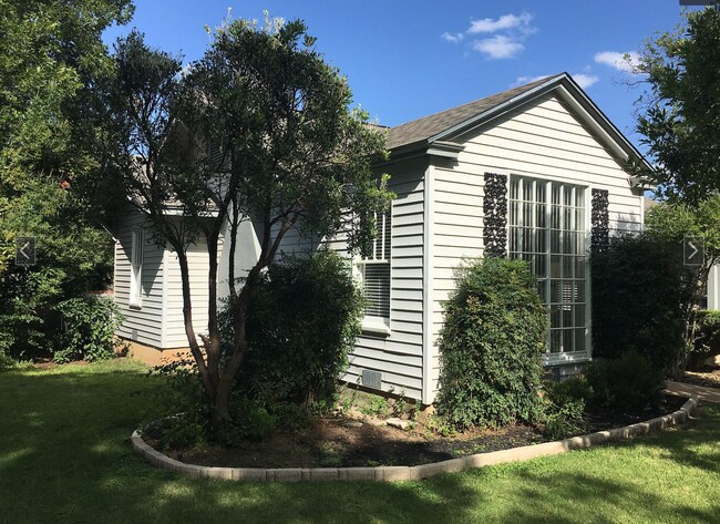 Front/Side of home. - 214 S Bishop St