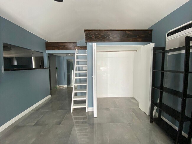 Big closet, stairs to loft - 653 Washington Ave
