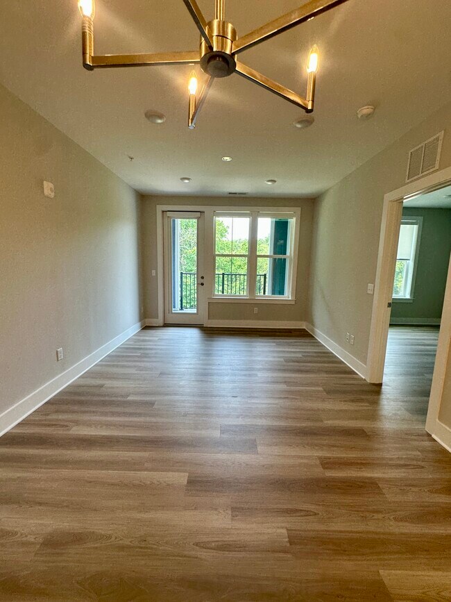 Hardwoods throughout. View of balcony - 76 Old Mill Bottom Rd N