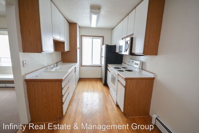 Building Photo - 3 br, 1 bath House - 2011 Viking Dr NW # 30