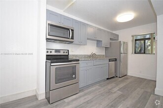 Building Photo - 301 Gardens Dr