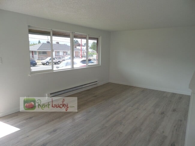 Building Photo - Super-Cute 2-Bedroom Home w/Attached Garag...