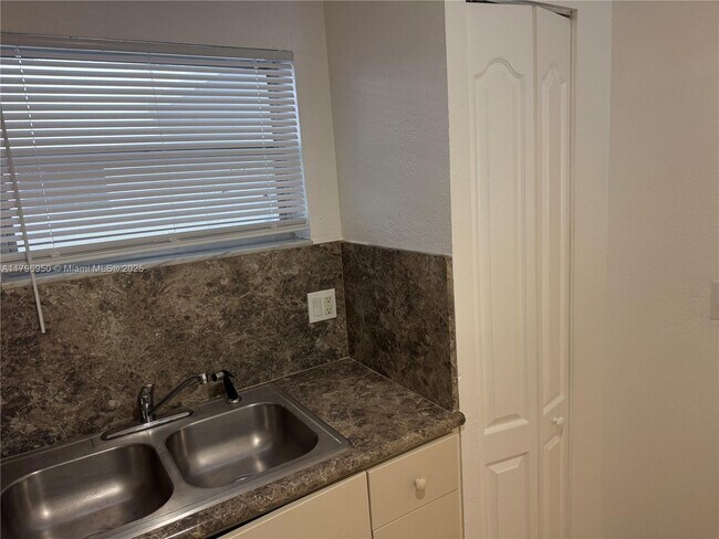 Building Photo - 4235 N University Dr