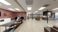 Located at 919 N Stone Ave in Tucson, Arizona, this single-floor amenity space is thoughtfully designed to foster community and recreation. The interior features light wood-style flooring throughout, a drop-tile ceiling with recessed panel lighting, and bold design accents that create an energetic yet welcoming atmosphere.

The lounge area offers generous seating with a mix of a large sectional sofa, colorful accent chairs, and a vibrant patterned area rug. Large floor-to-ceiling windows flood the space with natural light and provide views of an outdoor pool courtyard with palm trees, bringing the Tucson surroundings indoors. Southwestern-inspired artwork adorns the walls, reinforcing the local character of the space.

A standout feature is the striking multicolored textured accent wall, which anchors a dedicated media and lounge zone equipped with a wall-mounted flat-screen TV, built-in cabinetry, and a pair of retro globe pod chairs — ideal for private listening or relaxed viewing. Adjacent shelving units add functional display space.

The game room is well-appointed with two full-size billiard tables, a ping-pong table, and a cue rack, all set within an open, light-filled area with glass partition walls offering views into neighboring spaces. High-top bistro tables provide casual seating throughout. The space connects seamlessly to outdoor areas, making it a lively hub for social activity.