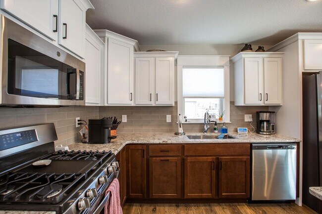 Building Photo - Stunning 4 Bed, 3 Bath Home | 3-Car Garage | Scenic Meadows