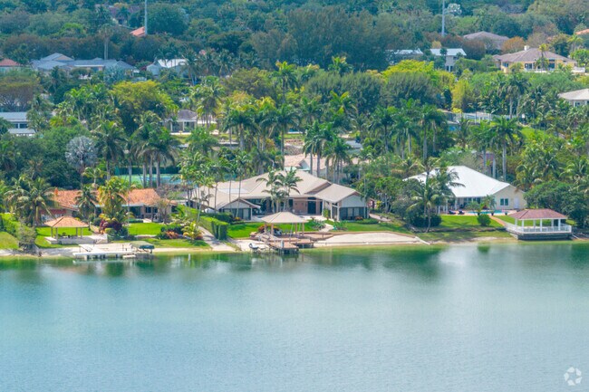 Large homes on lake by 92nd Ave in Kendall.