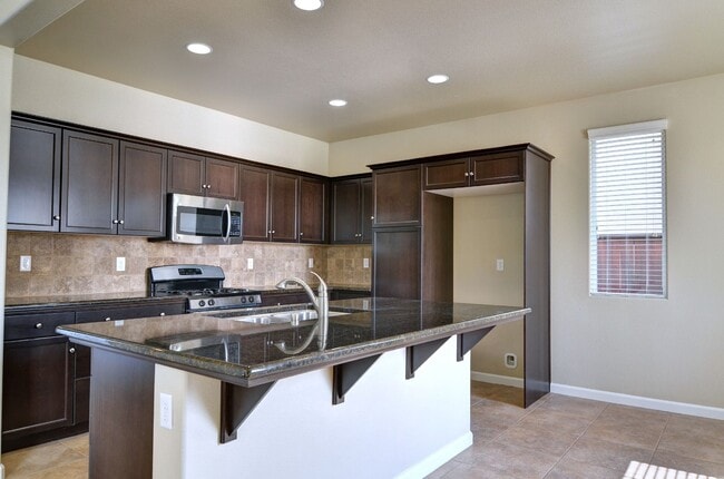 Building Photo - Fantastic Harlan Patio Home with Fenced Fr...