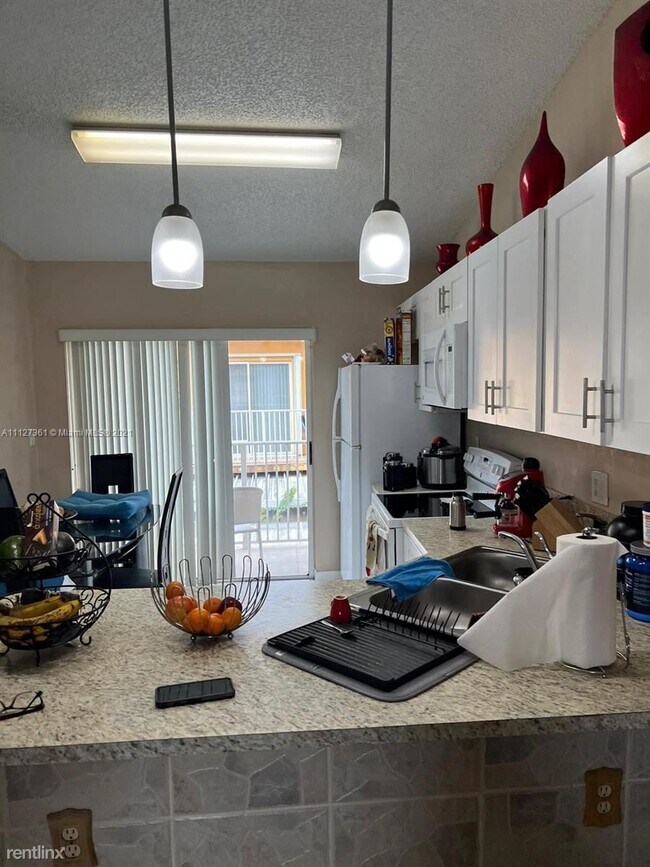 Building Photo - 3 br, 2 bath Condo - 7818 W 34th Ln