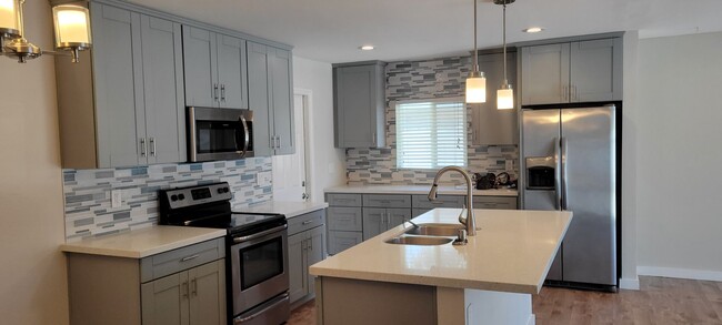 Building Photo - Beautifully complete remodeled single-stor...