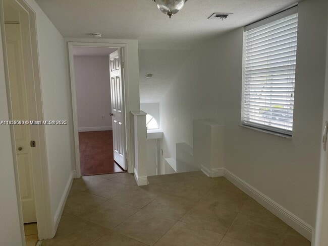 Building Photo - 4871 NW 97th Ct