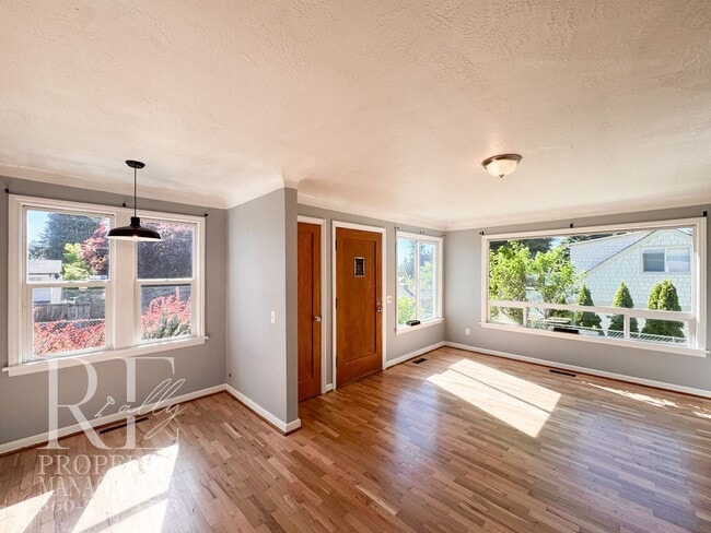 Building Photo - Timeless Charm Meets Comfort – 2-Bedroom Brick Home with Fireplace & Fenced Yard